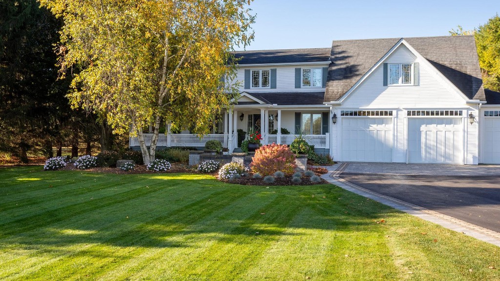 Residential lawn and property prepared for winter after fall cleanup in Edmonton